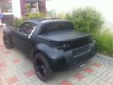 Foliendesign Barnim Vollverklebung Creative Design Smart Roadster schwarz matt