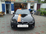 foliendesign vollverklebung design bmw schwarz orange