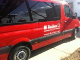 Mercedes Sprinter rot Vollverklebung + Werbung - Buchen Group